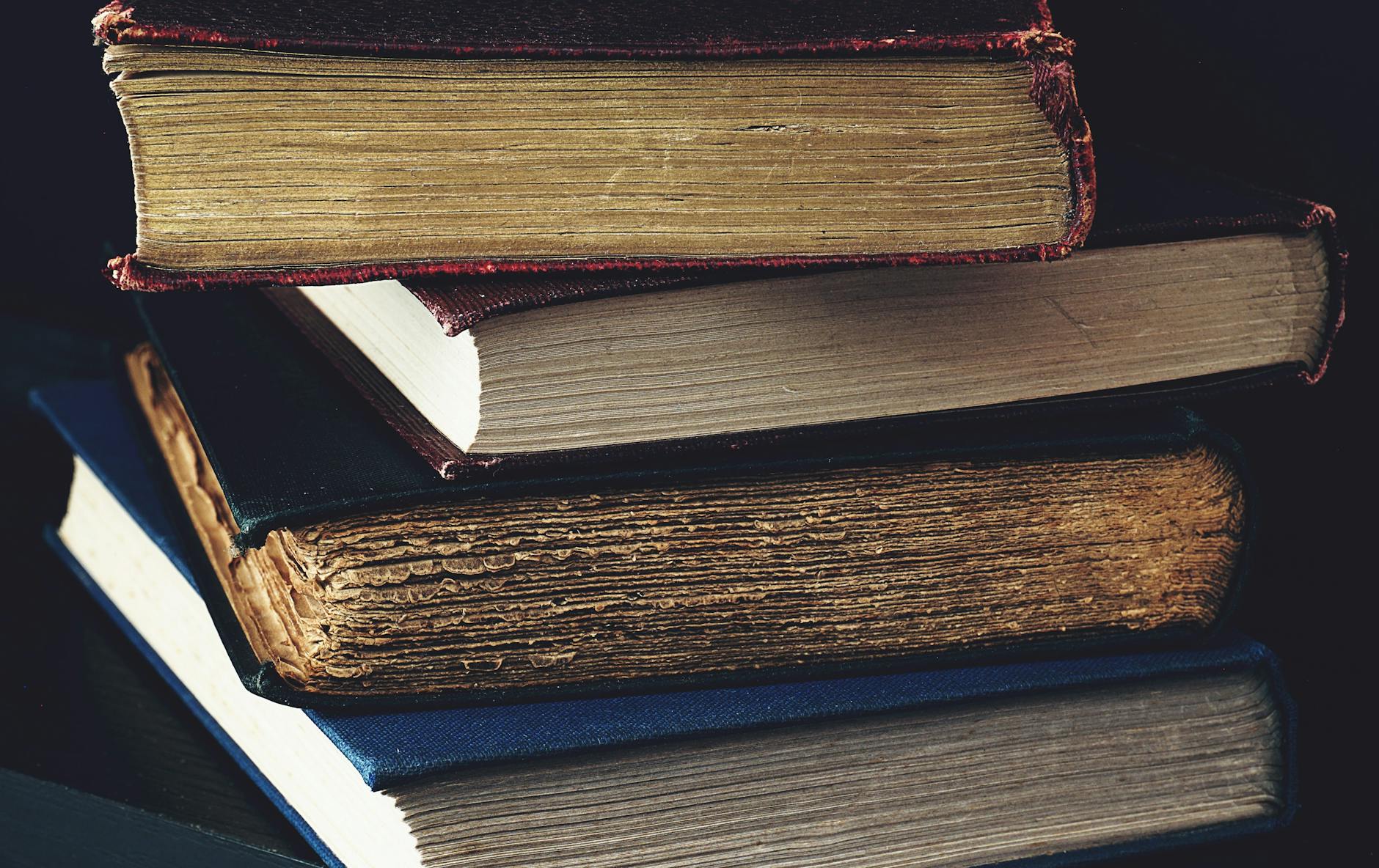 old books and quill