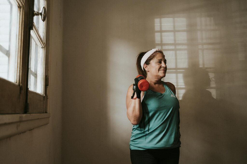 person exercising in modern gym