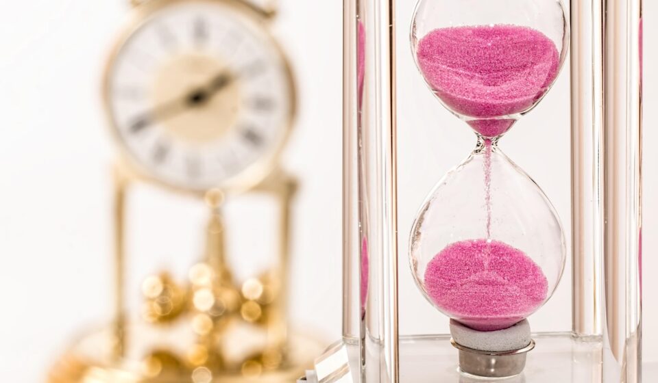 analog clock showing time subtraction