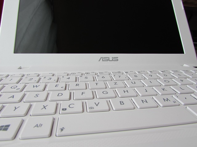 ASUS TUF Gaming laptop displaying game