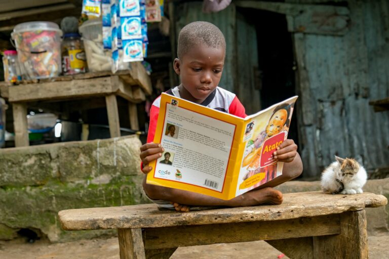 child reading biography book