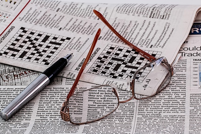 crossword grid with word plume filled in