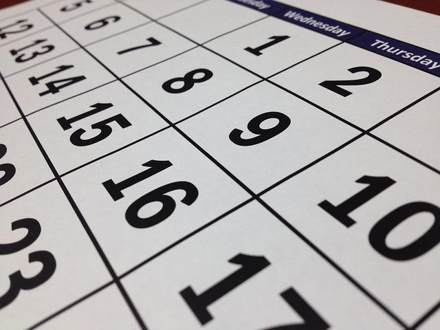 A personal planner with a date 28 days in the future circled and annotated with a reminder.