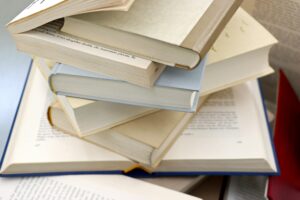 stack of biography books