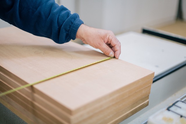 Chef precisely measuring out ingredients in grams using a digital scale