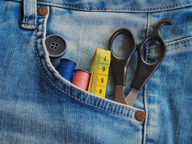 Measuring tape laid out to show length and width of a rectangular room (how to calculate square footage)