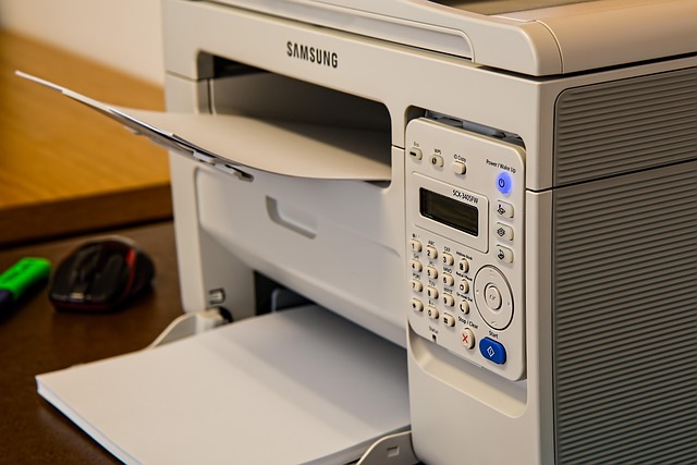 A 3D printer creating a small object that's approximately 25 cm long. (25 cm to inches)
