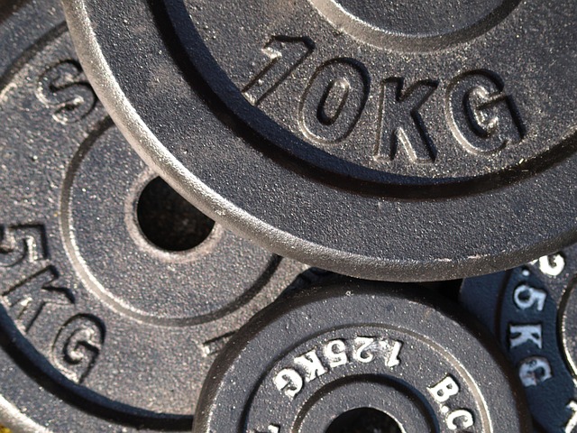 Weight conversion chart showing pounds to kilograms with 200 lbs highlighted (200lbs in kg)